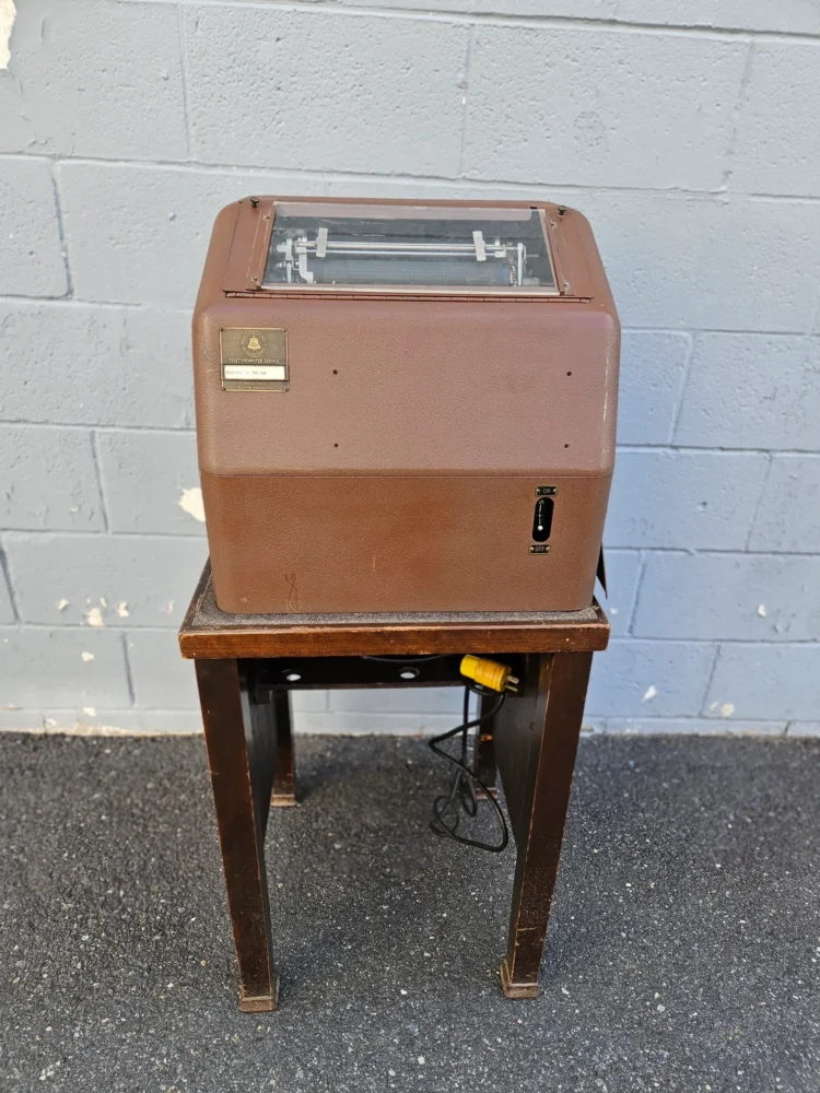 vintage microfilm reader on wooden stand